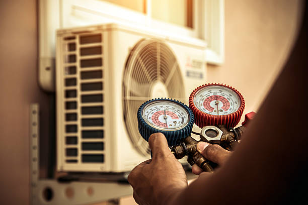 Professional Air Conditioning Service technician working in Collinsville, AL